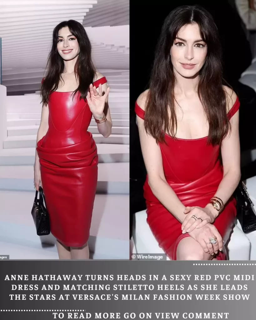 Anne Hathaway steals the spotlight in a fiery red PVC midi dress and coordinating stiletto heels at Versace’s Milan Fashion Week extravaganza