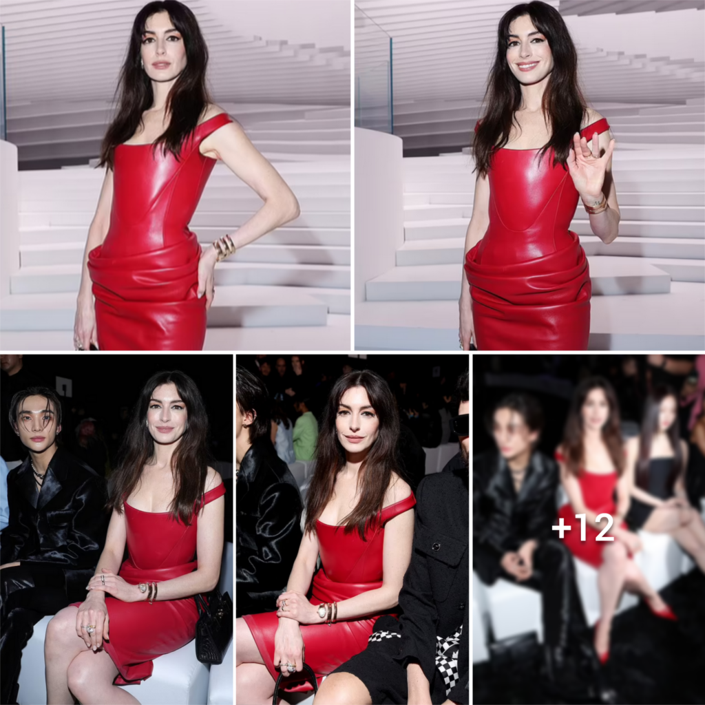 “Stunning in Scarlet: Anne Hathaway steals the spotlight at Versace’s Milan Fashion Week showcase in striking PVC ensemble”